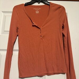 Burnt orange, long sleeve V-neck blouse
